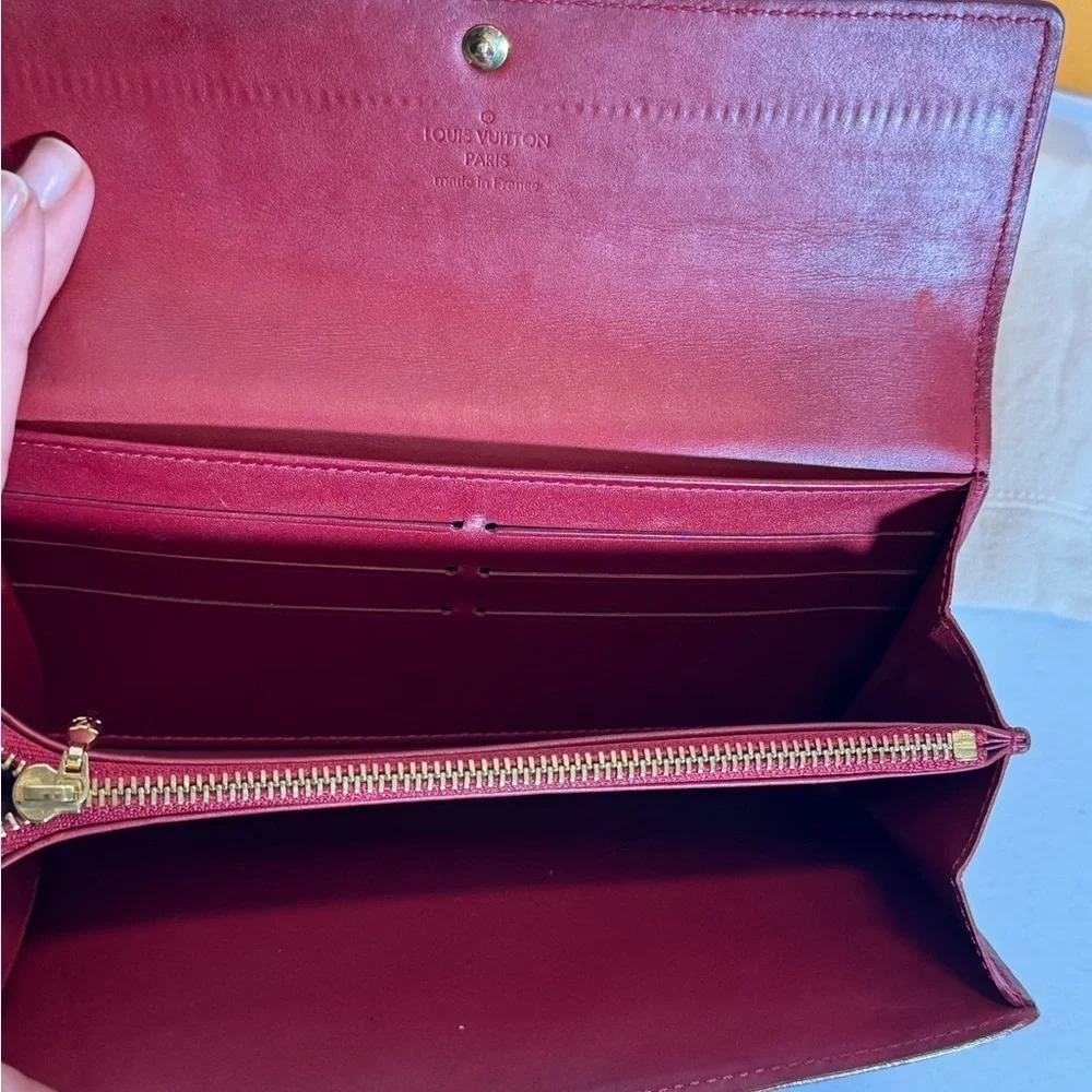 AUTHENTIC Louis Vuitton Red Wallet with Monogram Embossing